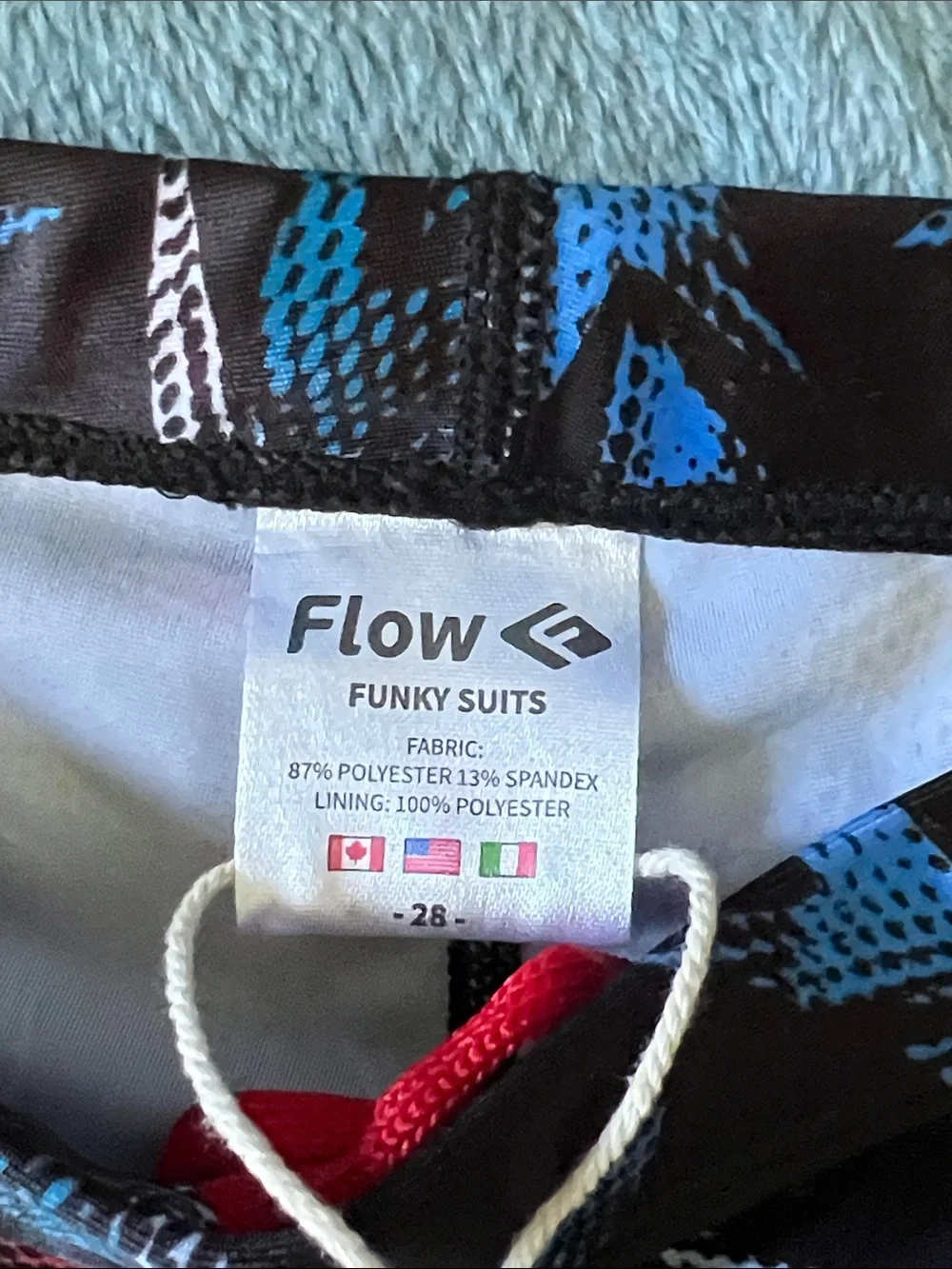 Flow Kids' Black Swim Trunks with Red, Blue & White Pattern